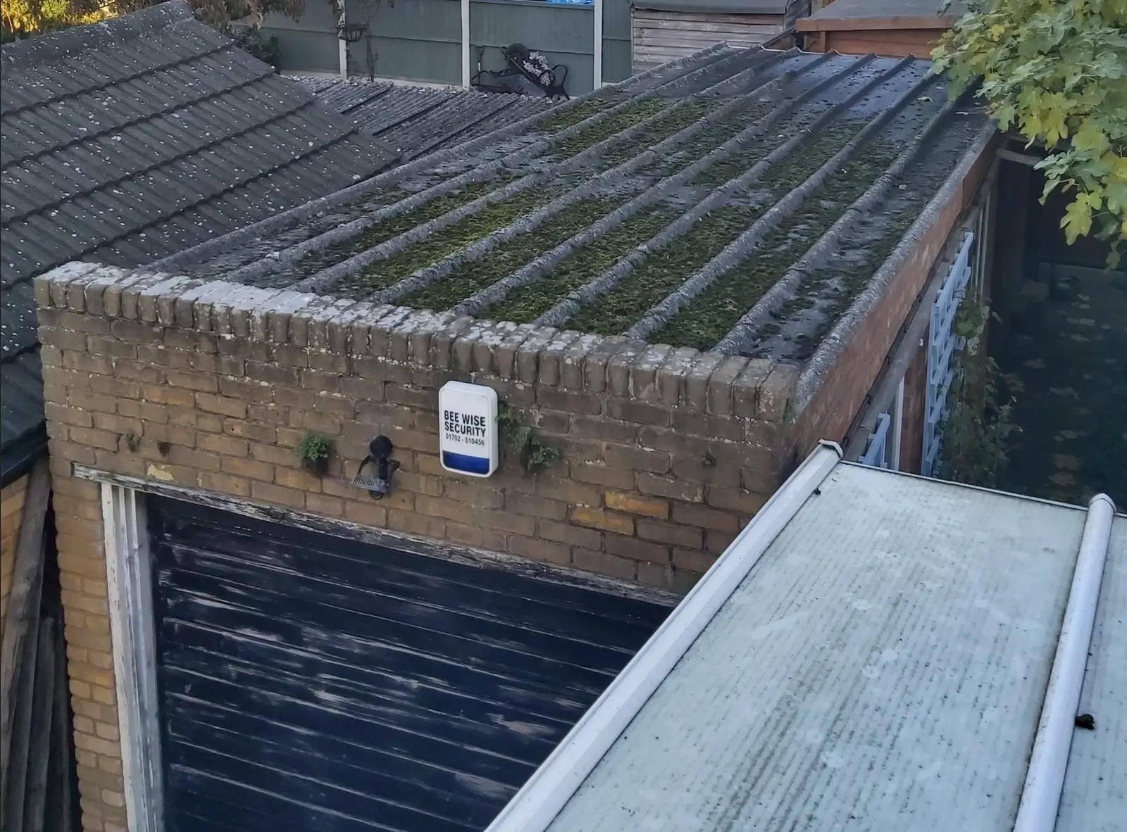 Corrugated garage and outbuilding roofs shown as asbestos shed roof removal context for Teesside